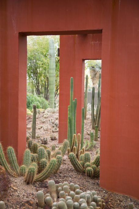 red concrete arch desert botanical garden green cacti