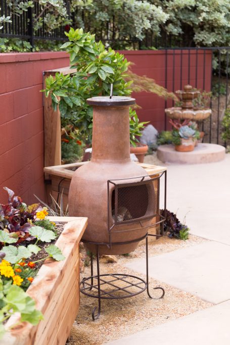 chimenea in succulent garden