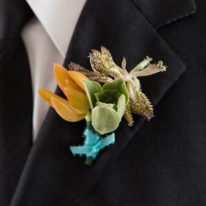 orange green blue succulent boutonniere