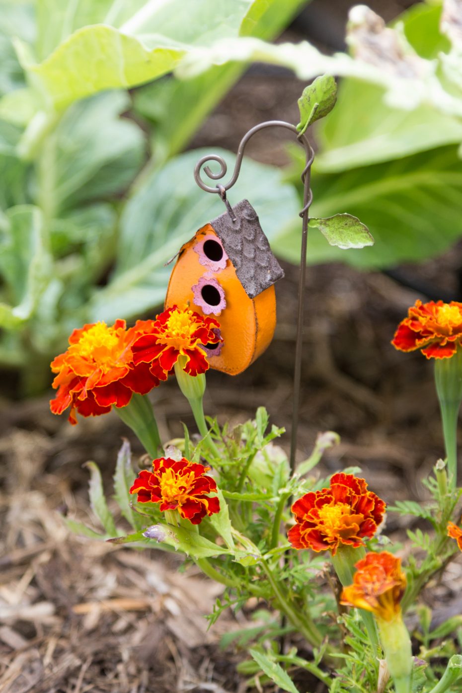 tiny orange birdhouse decoration