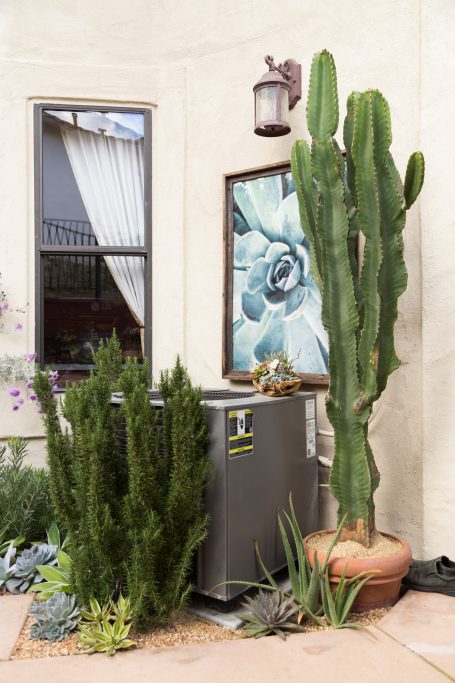 decorations around air conditioner to make the area more attractive