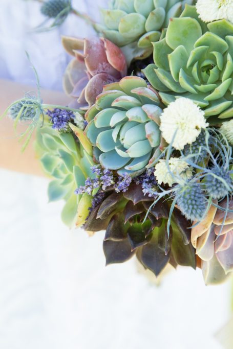 close up bridal wedding bouquet with succulents