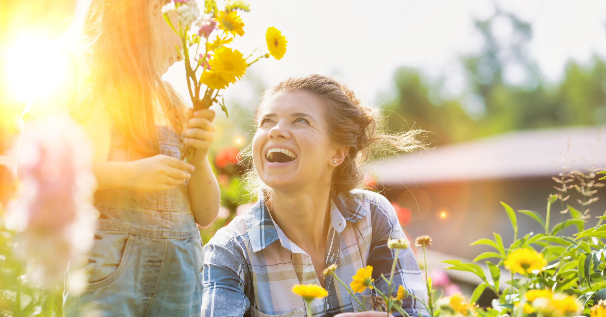 Adobe Stock Moodboard mother daughter picking colorful flowers garden