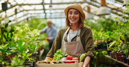 Aobe Stock Pressmaster woman holding vegetables in greenhouse