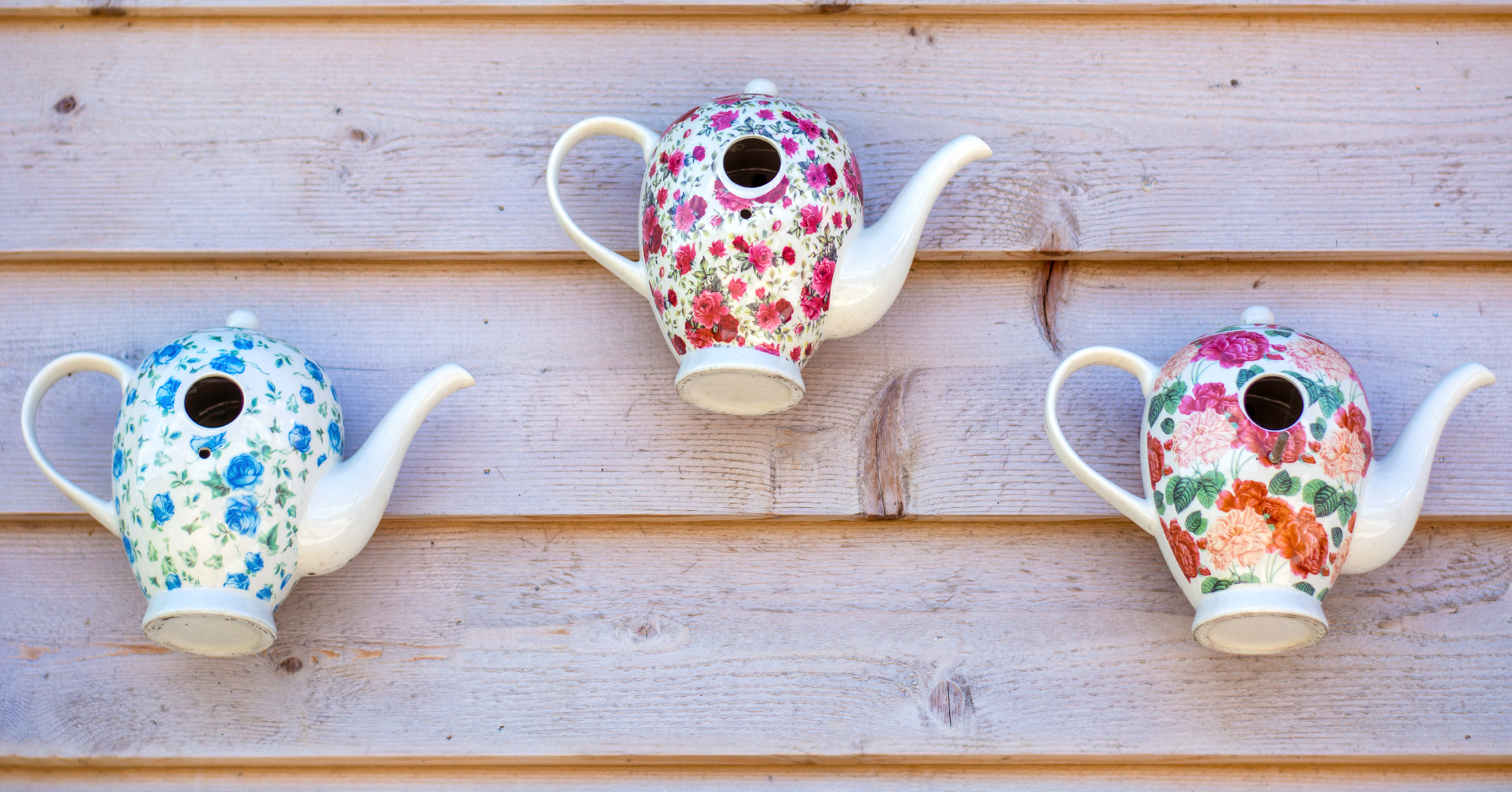 Adobe Stock Evelien colorful painted teapot birdhouses